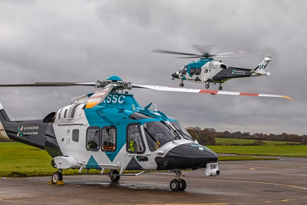 2 Kent Surrey & Sussex Air Ambulances at an airfield